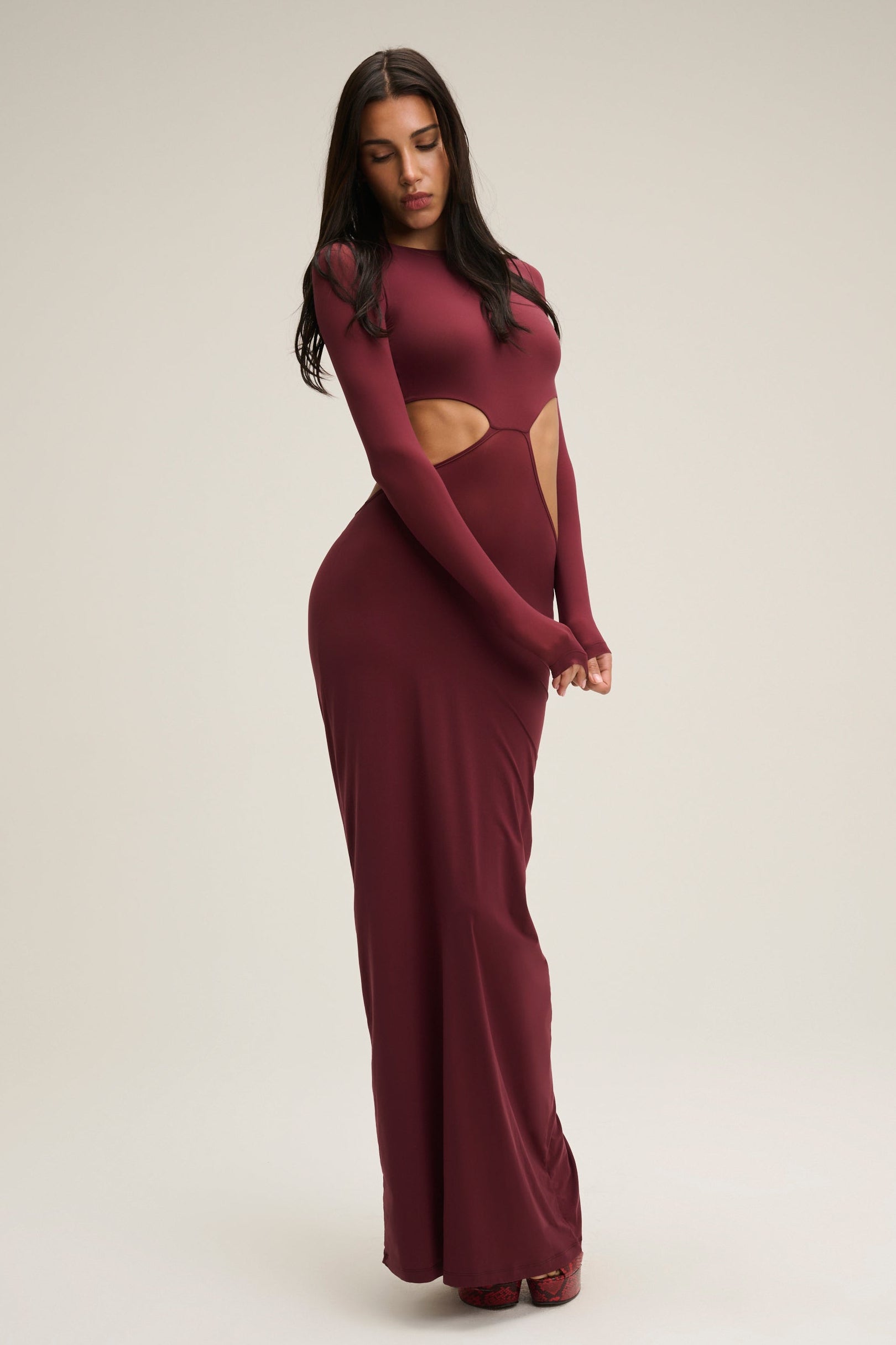 The Cher Long Sleeve Cut-Out Dress - Burgundy CHAM The Cher Long Sleeve Cut-Out Dress - Burgundy CHAM